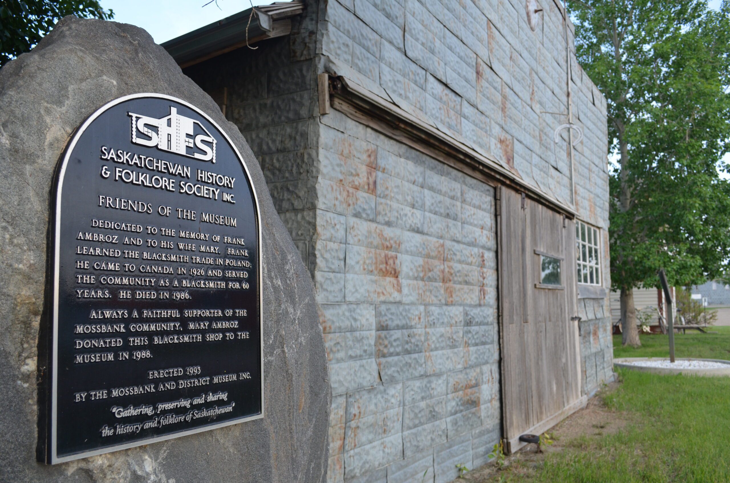 Plaque on museum about SK Historty & Folklore Society